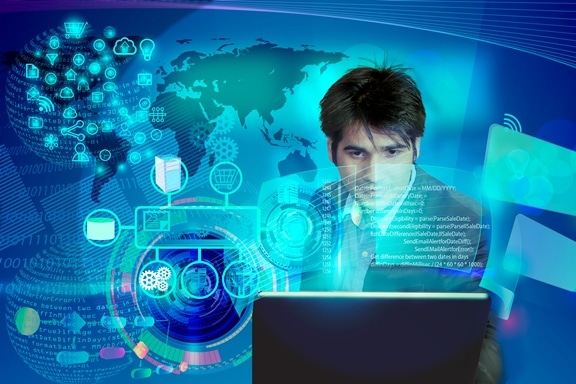 A man works on a computer to earn enterprise architecture certification